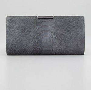 Milly snakeskin clutch